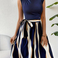Lucy – stylish patchwork dress with belt and striped print
