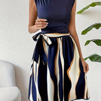 Lucy – stylish patchwork dress with belt and striped print