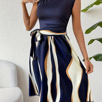 Lucy – stylish patchwork dress with belt and striped print